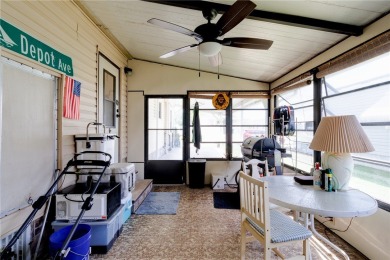 Inviting layout with lots of windows and open floor plan. The on Barefoot Bay Golf Course in Florida - for sale on GolfHomes.com, golf home, golf lot