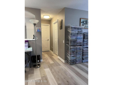 This amazing house features beautiful 21''cathedral ceilings in on Golf Club At Fleming Island in Florida - for sale on GolfHomes.com, golf home, golf lot