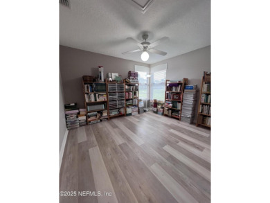 This amazing house features beautiful 21''cathedral ceilings in on Golf Club At Fleming Island in Florida - for sale on GolfHomes.com, golf home, golf lot