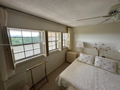 This 2/2 condo in the desirable Palm-Aire community on the 7th on Palm-Aire Country Club and Resort - Palms in Florida - for sale on GolfHomes.com, golf home, golf lot