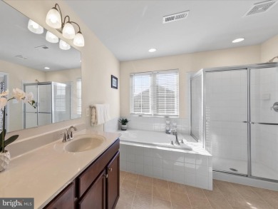 This beautiful three-story townhouse in the highly sought-after on Plantation Lakes Golf and Country Club in Delaware - for sale on GolfHomes.com, golf home, golf lot