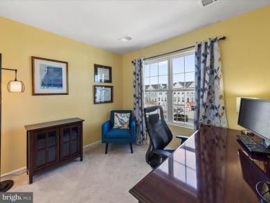 This beautiful three-story townhouse in the highly sought-after on Plantation Lakes Golf and Country Club in Delaware - for sale on GolfHomes.com, golf home, golf lot