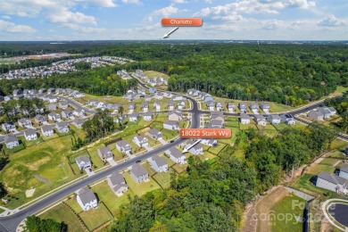Welcome to 18022 Stark Way! This fantastic 4 bedroom, 3.5 bath on The Palisades Country Club in North Carolina - for sale on GolfHomes.com, golf home, golf lot