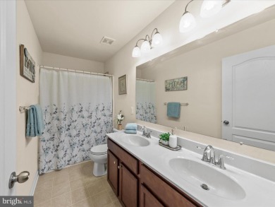 This beautiful three-story townhouse in the highly sought-after on Plantation Lakes Golf and Country Club in Delaware - for sale on GolfHomes.com, golf home, golf lot