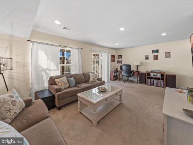 This beautiful three-story townhouse in the highly sought-after on Plantation Lakes Golf and Country Club in Delaware - for sale on GolfHomes.com, golf home, golf lot