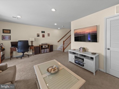 This beautiful three-story townhouse in the highly sought-after on Plantation Lakes Golf and Country Club in Delaware - for sale on GolfHomes.com, golf home, golf lot