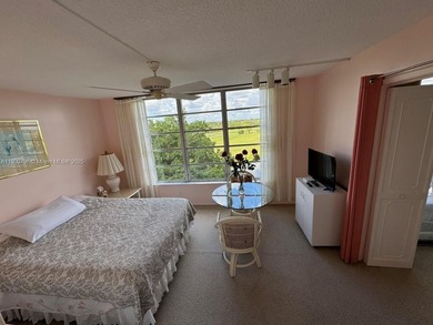 This 2/2 condo in the desirable Palm-Aire community on the 7th on Palm-Aire Country Club and Resort - Palms in Florida - for sale on GolfHomes.com, golf home, golf lot