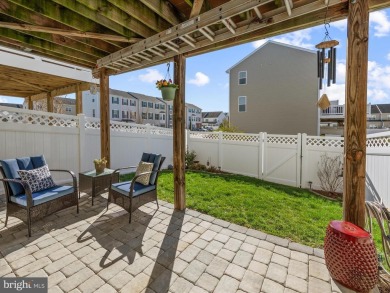 This beautiful three-story townhouse in the highly sought-after on Plantation Lakes Golf and Country Club in Delaware - for sale on GolfHomes.com, golf home, golf lot