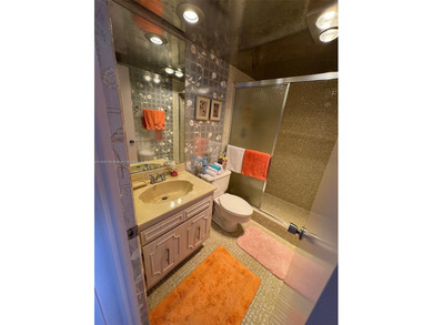 This 2/2 condo in the desirable Palm-Aire community on the 7th on Palm-Aire Country Club and Resort - Palms in Florida - for sale on GolfHomes.com, golf home, golf lot