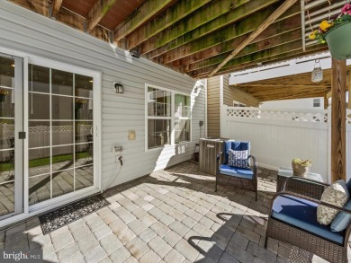 This beautiful three-story townhouse in the highly sought-after on Plantation Lakes Golf and Country Club in Delaware - for sale on GolfHomes.com, golf home, golf lot