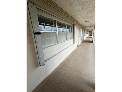 This 2/2 condo in the desirable Palm-Aire community on the 7th on Palm-Aire Country Club and Resort - Palms in Florida - for sale on GolfHomes.com, golf home, golf lot