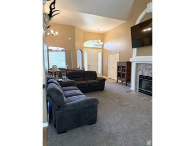 Tucked away on a quiet cul-de-sac and backing directly onto the on Stansbury Park Golf Club in Utah - for sale on GolfHomes.com, golf home, golf lot
