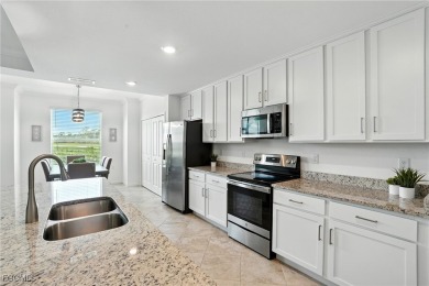 Own this first-floor DiAngelo veranda with deeded golf on Heritage Landing Golf  in Florida - for sale on GolfHomes.com, golf home, golf lot