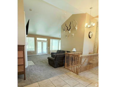 Tucked away on a quiet cul-de-sac and backing directly onto the on Stansbury Park Golf Club in Utah - for sale on GolfHomes.com, golf home, golf lot
