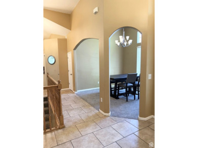 Tucked away on a quiet cul-de-sac and backing directly onto the on Stansbury Park Golf Club in Utah - for sale on GolfHomes.com, golf home, golf lot