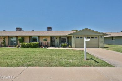 This updated home near the Sun Dial Recreation Center features a on Sun City Lakes West and East in Arizona - for sale on GolfHomes.com, golf home, golf lot