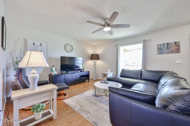 This updated home near the Sun Dial Recreation Center features a on Sun City Lakes West and East in Arizona - for sale on GolfHomes.com, golf home, golf lot