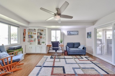 This updated home near the Sun Dial Recreation Center features a on Sun City Lakes West and East in Arizona - for sale on GolfHomes.com, golf home, golf lot