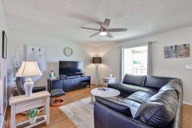 This updated home near the Sun Dial Recreation Center features a on Sun City Lakes West and East in Arizona - for sale on GolfHomes.com, golf home, golf lot