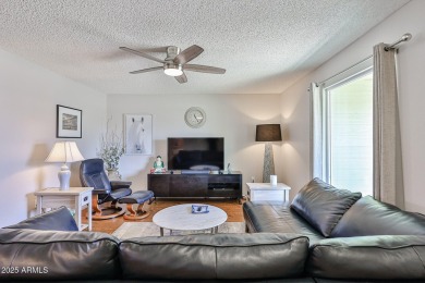 This updated home near the Sun Dial Recreation Center features a on Sun City Lakes West and East in Arizona - for sale on GolfHomes.com, golf home, golf lot