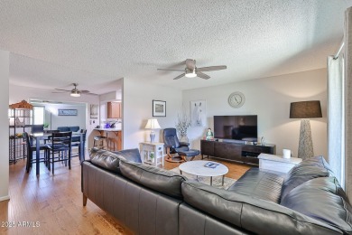 This updated home near the Sun Dial Recreation Center features a on Sun City Lakes West and East in Arizona - for sale on GolfHomes.com, golf home, golf lot