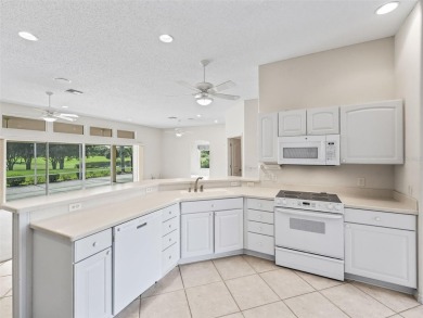 One or more photo(s) has been virtually staged. CUSTOM Magnolia on El Santiago Executive Golf Course in Florida - for sale on GolfHomes.com, golf home, golf lot