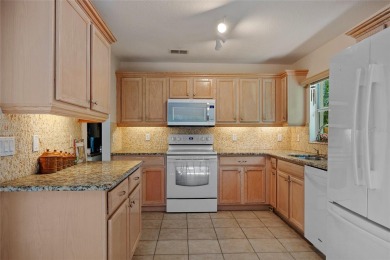 WELL-MAINTAINED 2 BEDROOM, 2 BATH PLUS DEN, 2-CAR GARAGE LOCATED on Kings Gate Golf Club in Florida - for sale on GolfHomes.com, golf home, golf lot