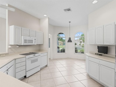 One or more photo(s) has been virtually staged. CUSTOM Magnolia on El Santiago Executive Golf Course in Florida - for sale on GolfHomes.com, golf home, golf lot