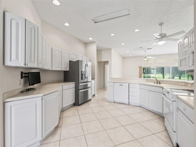 One or more photo(s) has been virtually staged. CUSTOM Magnolia on El Santiago Executive Golf Course in Florida - for sale on GolfHomes.com, golf home, golf lot