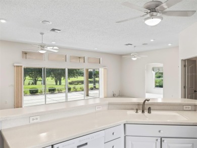 One or more photo(s) has been virtually staged. CUSTOM Magnolia on El Santiago Executive Golf Course in Florida - for sale on GolfHomes.com, golf home, golf lot