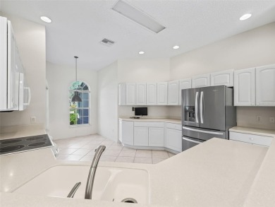 One or more photo(s) has been virtually staged. CUSTOM Magnolia on El Santiago Executive Golf Course in Florida - for sale on GolfHomes.com, golf home, golf lot