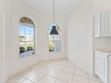 One or more photo(s) has been virtually staged. CUSTOM Magnolia on El Santiago Executive Golf Course in Florida - for sale on GolfHomes.com, golf home, golf lot