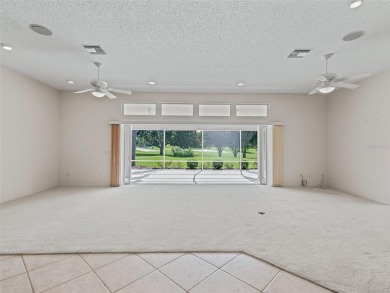 One or more photo(s) has been virtually staged. CUSTOM Magnolia on El Santiago Executive Golf Course in Florida - for sale on GolfHomes.com, golf home, golf lot