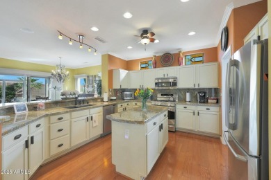 Welcome home to this extended Verde with upgrades in all of the on Sun City Grand Golf Couse and Club in Arizona - for sale on GolfHomes.com, golf home, golf lot