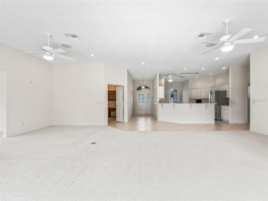 One or more photo(s) has been virtually staged. CUSTOM Magnolia on El Santiago Executive Golf Course in Florida - for sale on GolfHomes.com, golf home, golf lot