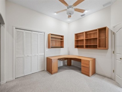 One or more photo(s) has been virtually staged. CUSTOM Magnolia on El Santiago Executive Golf Course in Florida - for sale on GolfHomes.com, golf home, golf lot