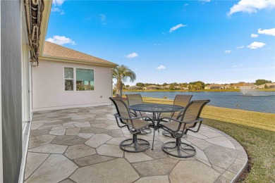 Stunning lakefront executive home with added bonus room that is on Eagle Ridge At Spruce Creek Country Club in Florida - for sale on GolfHomes.com, golf home, golf lot