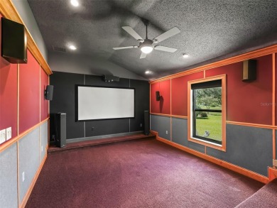 One or more photo(s) has been virtually staged. CUSTOM Magnolia on El Santiago Executive Golf Course in Florida - for sale on GolfHomes.com, golf home, golf lot