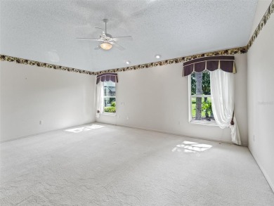 One or more photo(s) has been virtually staged. CUSTOM Magnolia on El Santiago Executive Golf Course in Florida - for sale on GolfHomes.com, golf home, golf lot