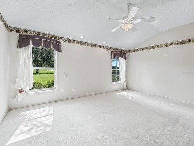 One or more photo(s) has been virtually staged. CUSTOM Magnolia on El Santiago Executive Golf Course in Florida - for sale on GolfHomes.com, golf home, golf lot
