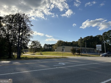 Unique opportunity with abundant possibilities! Attractive on Uncle Remus Golf Course in Georgia - for sale on GolfHomes.com, golf home, golf lot