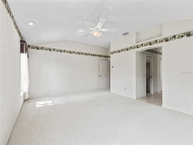 One or more photo(s) has been virtually staged. CUSTOM Magnolia on El Santiago Executive Golf Course in Florida - for sale on GolfHomes.com, golf home, golf lot