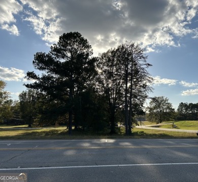 Unique opportunity with abundant possibilities! Attractive on Uncle Remus Golf Course in Georgia - for sale on GolfHomes.com, golf home, golf lot