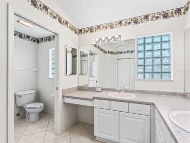 One or more photo(s) has been virtually staged. CUSTOM Magnolia on El Santiago Executive Golf Course in Florida - for sale on GolfHomes.com, golf home, golf lot