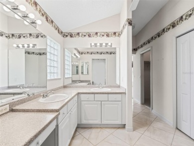 One or more photo(s) has been virtually staged. CUSTOM Magnolia on El Santiago Executive Golf Course in Florida - for sale on GolfHomes.com, golf home, golf lot