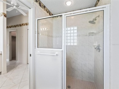 One or more photo(s) has been virtually staged. CUSTOM Magnolia on El Santiago Executive Golf Course in Florida - for sale on GolfHomes.com, golf home, golf lot