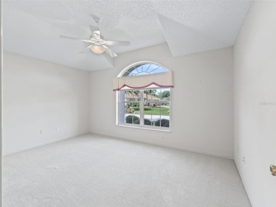 One or more photo(s) has been virtually staged. CUSTOM Magnolia on El Santiago Executive Golf Course in Florida - for sale on GolfHomes.com, golf home, golf lot