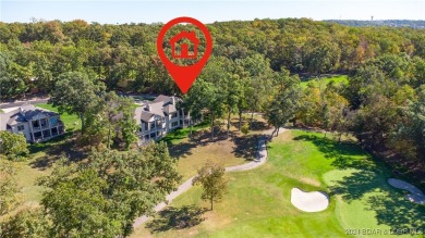 STUNNING lakeview villa situated on the 7th hole of Missouri's on The Club At Porto Cima in Missouri - for sale on GolfHomes.com, golf home, golf lot