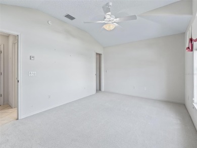 One or more photo(s) has been virtually staged. CUSTOM Magnolia on El Santiago Executive Golf Course in Florida - for sale on GolfHomes.com, golf home, golf lot