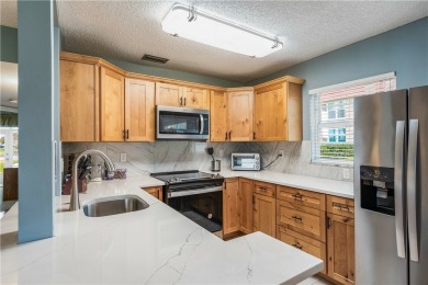 It's ALL about the VIEW! Well cared for & updated ground floor on The American Golf Club in Florida - for sale on GolfHomes.com, golf home, golf lot